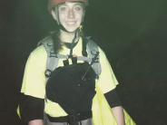 Rescuer wearing helmet and gear