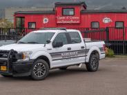 Sheriff Vehicle with Wayside Background